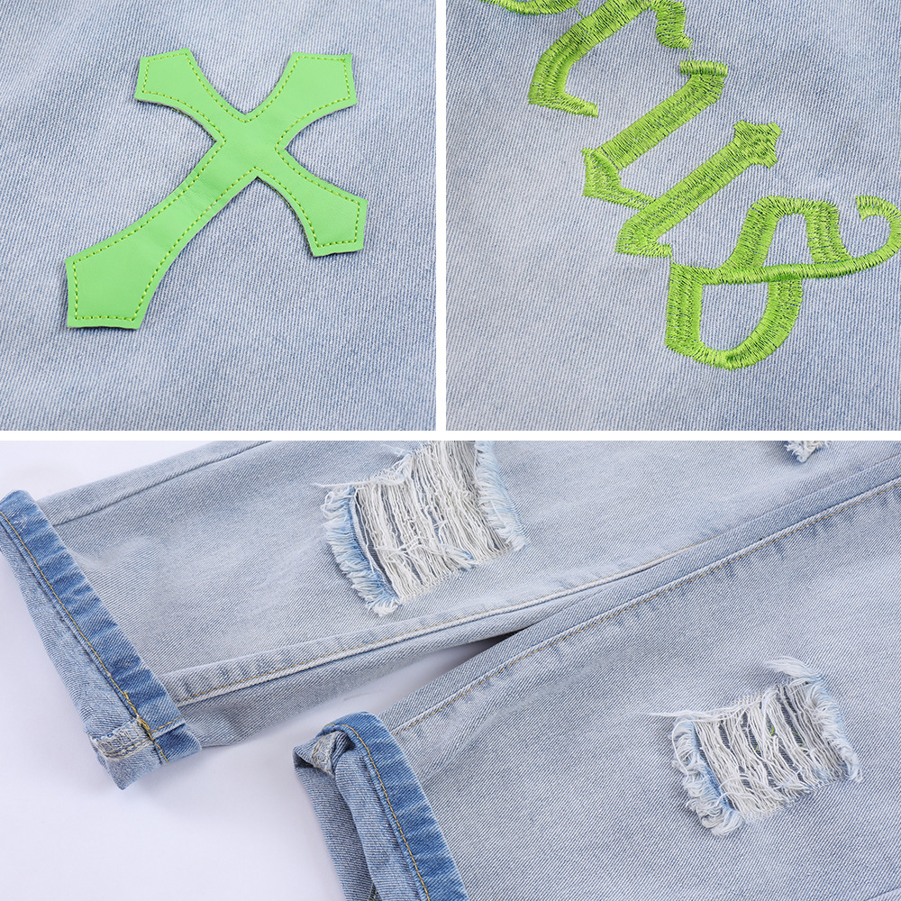 Torn embroidered jeans