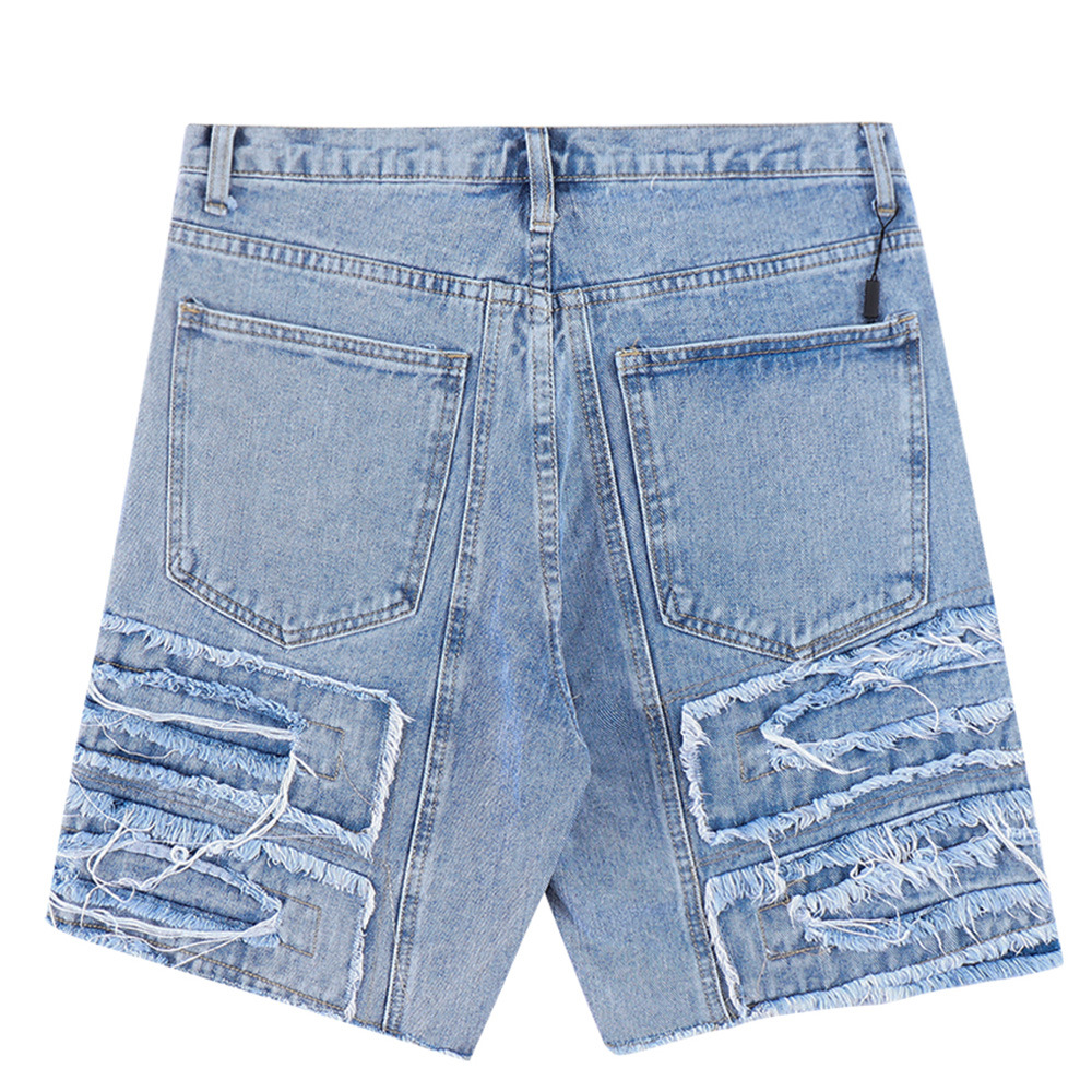 Ripped and torn cat whisker denim shorts