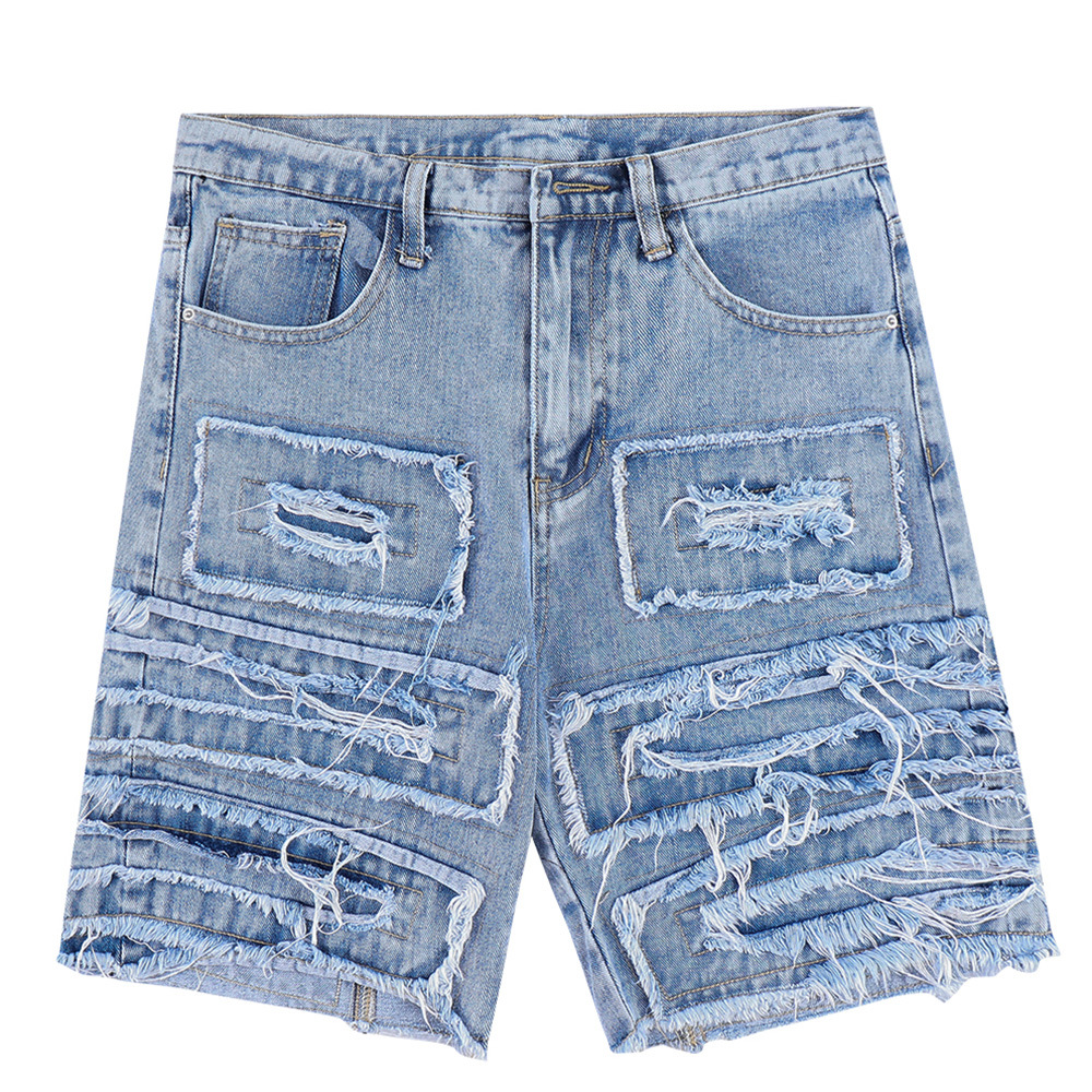 Ripped and torn cat whisker denim shorts