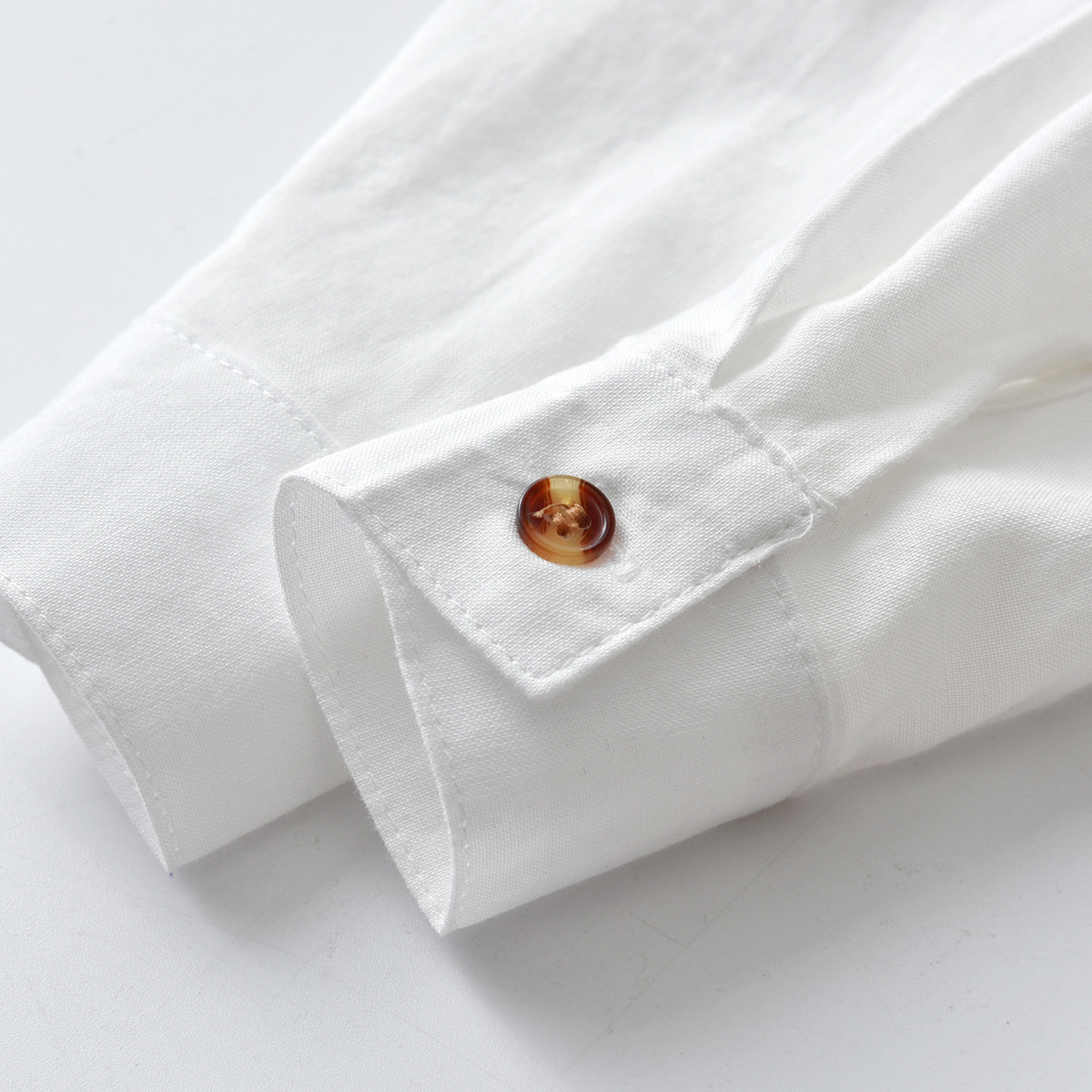 Boys’ plain white long-sleeved shirts