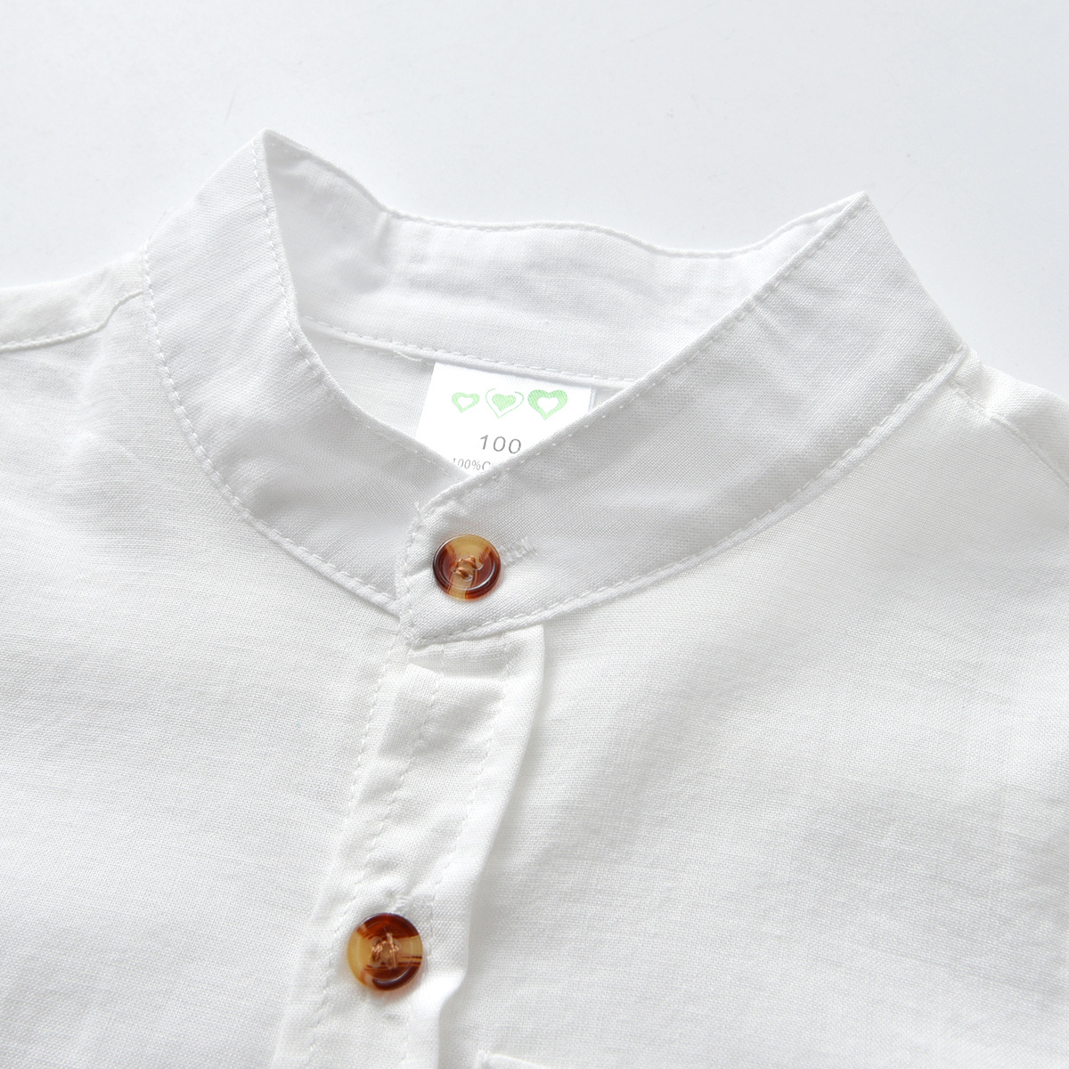 Boys’ plain white long-sleeved shirts