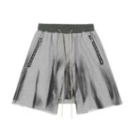 Zip pocket raw edges colour blocked lace-up spray-painted sports shorts